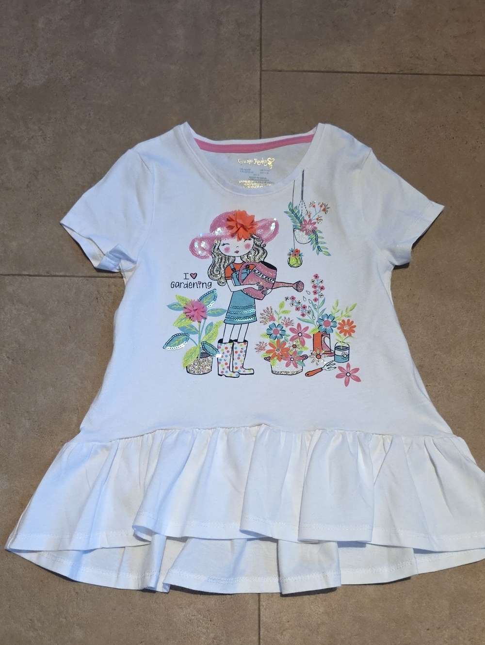 Girls White Ruffle Hem Gardening Tee with Floral Graphic. Size S 5/6